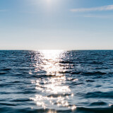 sun-on-blue-sky-is-reflected-on-water-1440x2560_89445-mm-90a4810122c55ff21fcdabf57da2db29d5